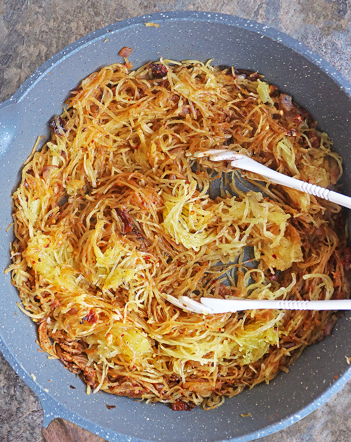 Sautéing spaghetti squash to make an easy spicy delicious sauté.