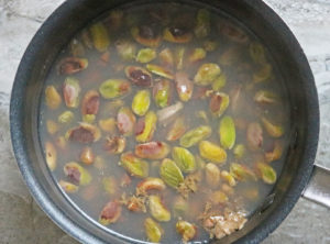 Adding pistachios to boiling water