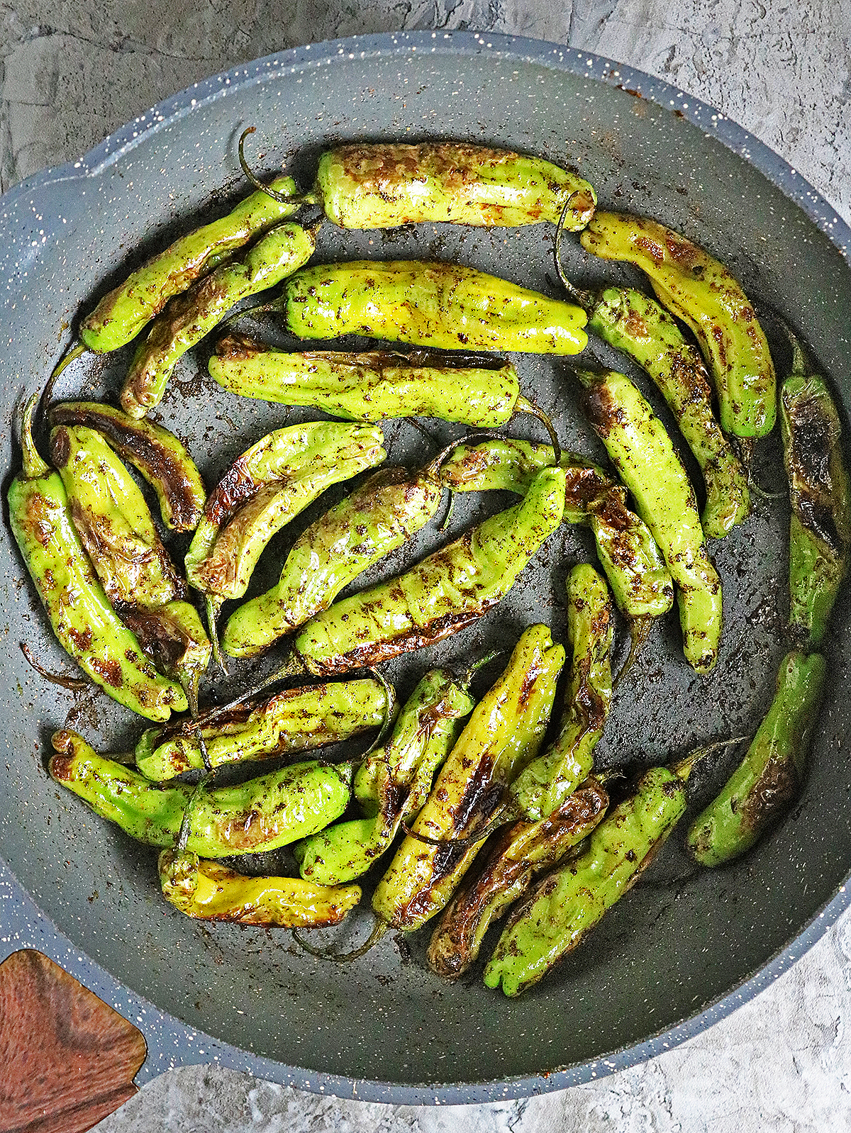 Cooking shishito peppers so they are nice and blistered