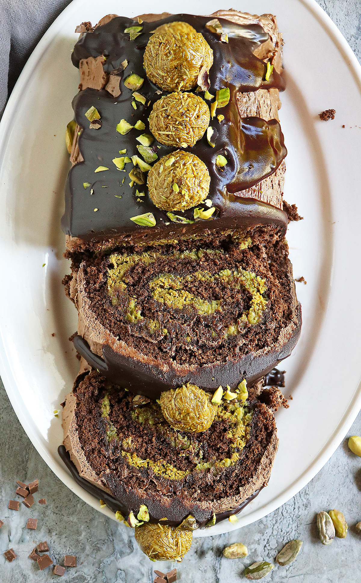 Slicing into the Dubai Chocolate Roll Cake