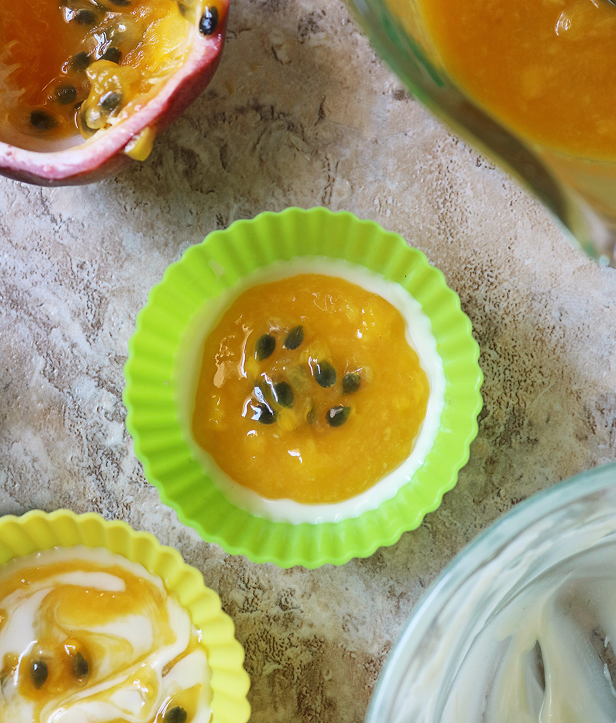 Step three adding passionfruit on top of mango layer