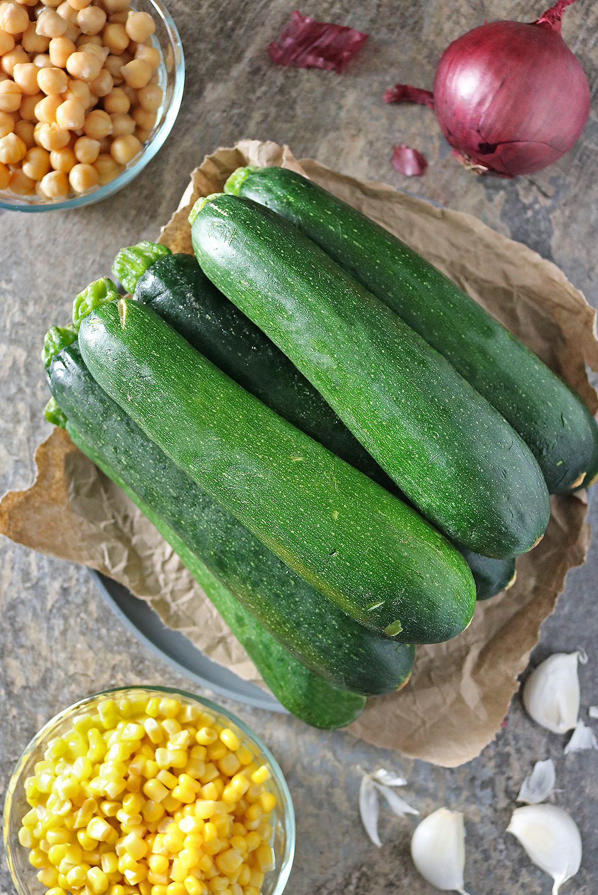 5 ingredients needed to make this zucchini onion salad.