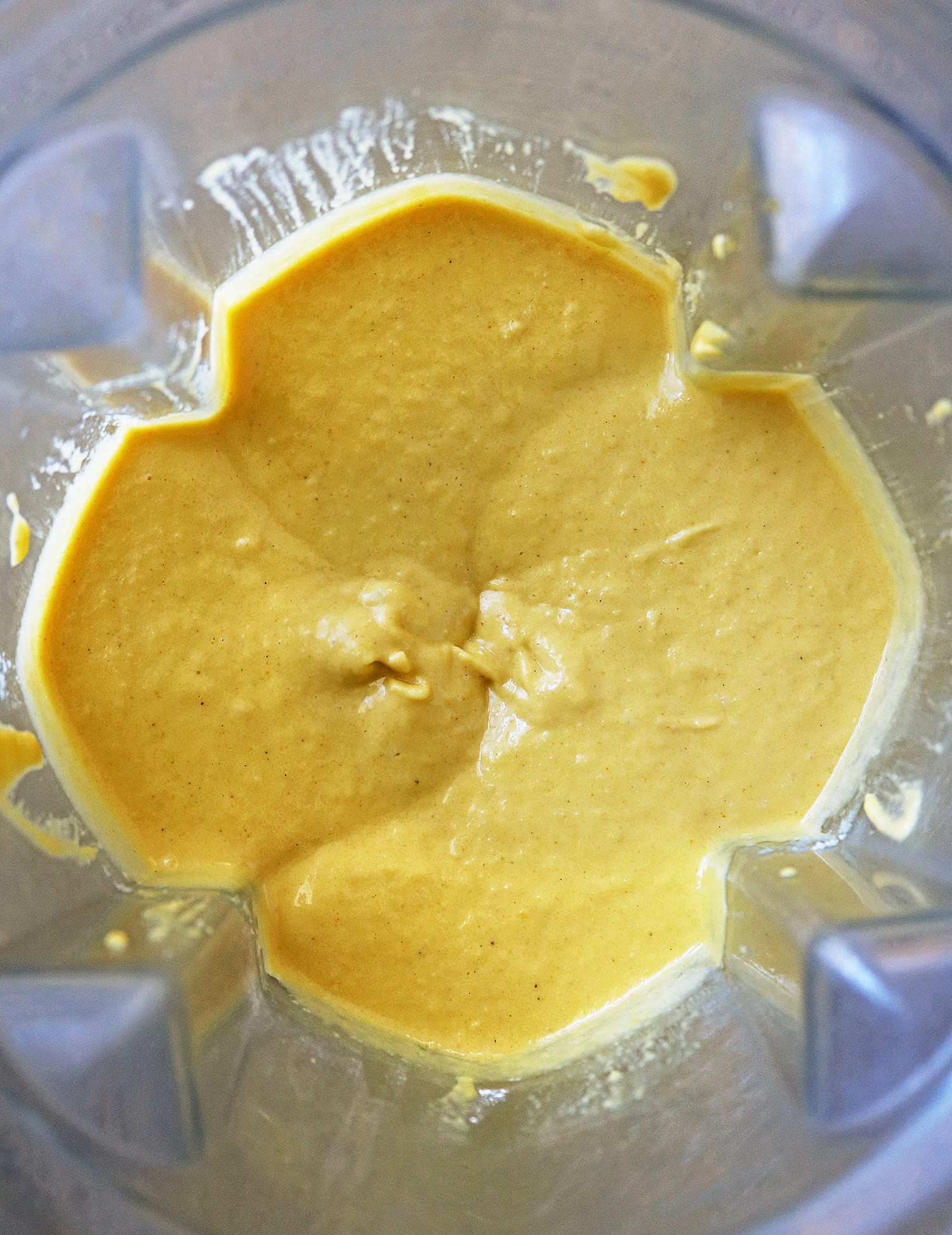 Blending all the ingredients together to make this refined sugar-free cake