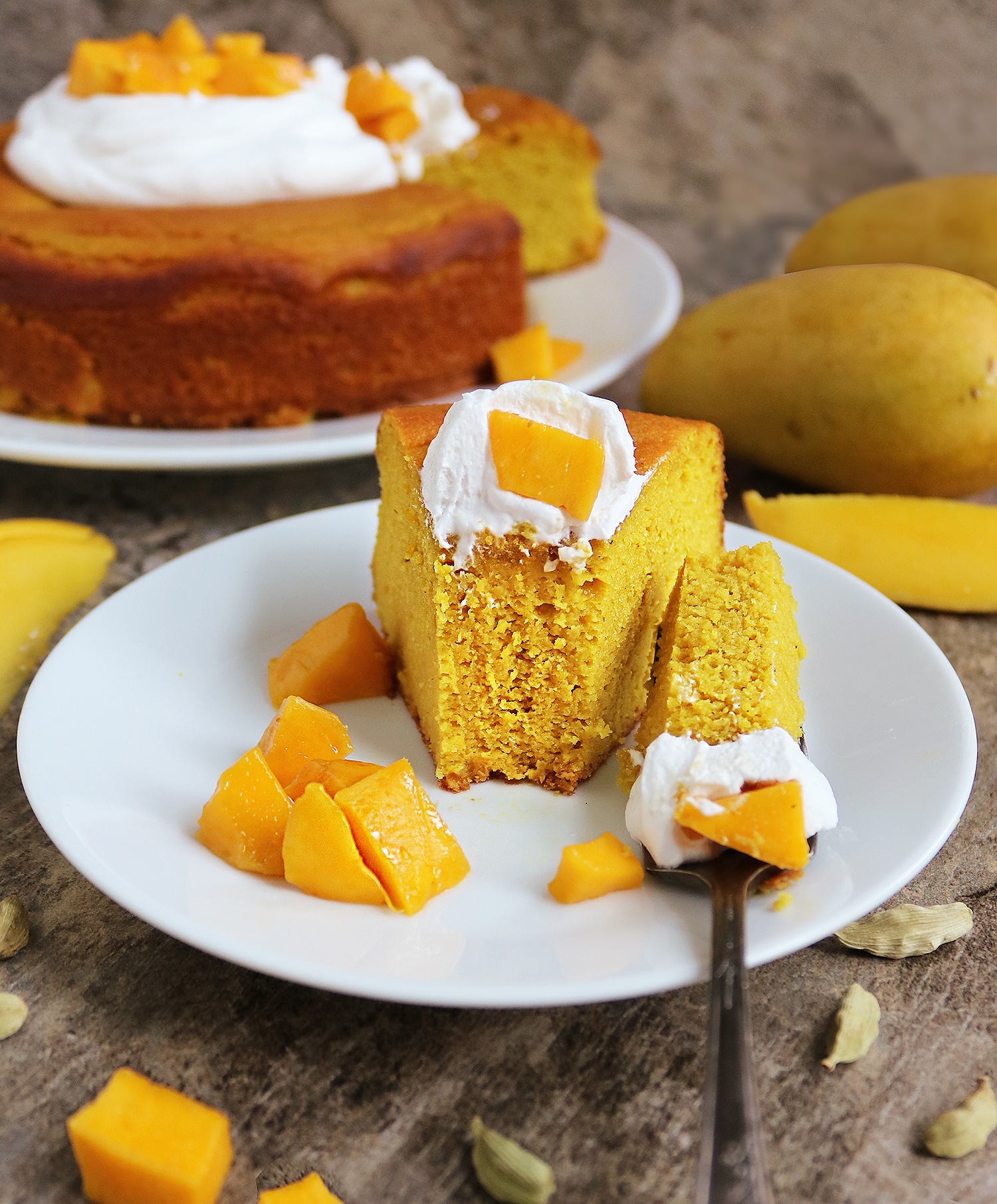 Taking a bite of this delicious and Easy Refined Sugar-free Cardamom Mango Cake