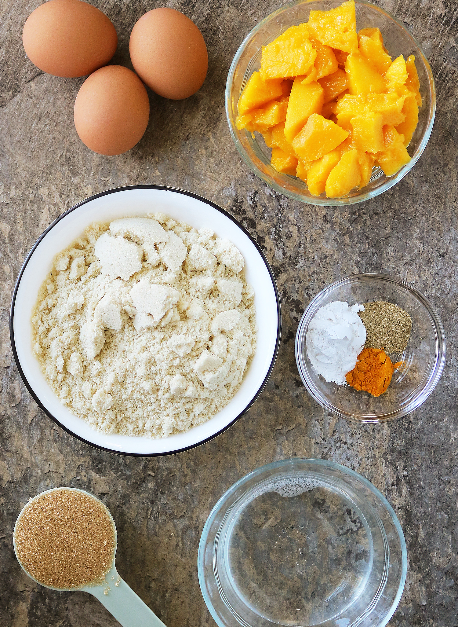 Overhead view of the Ingredients needed to make this refined sugar-free mango cake.