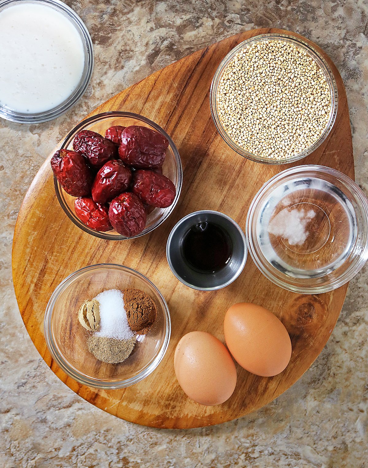 10 ingredients to make blender prepped jujube bars on a wooden board.