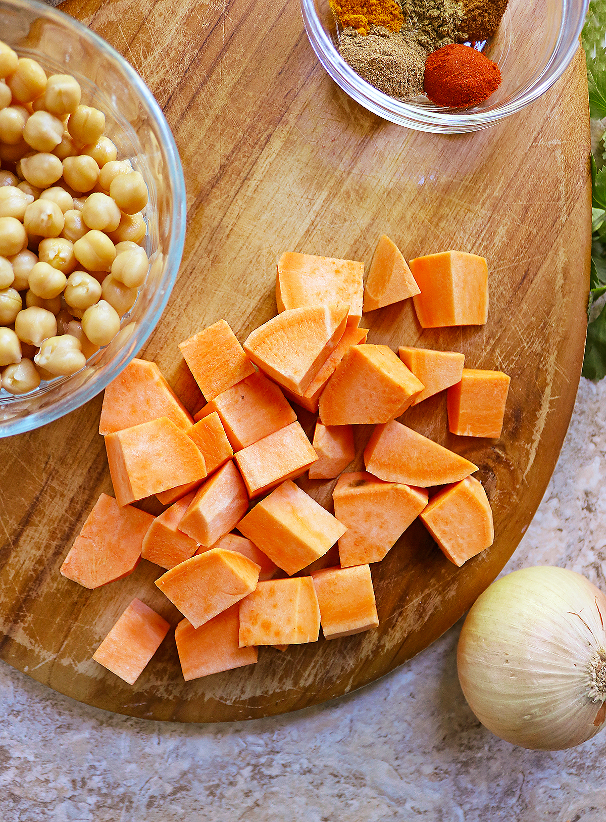 Cutting the sweet potatoes into cubes