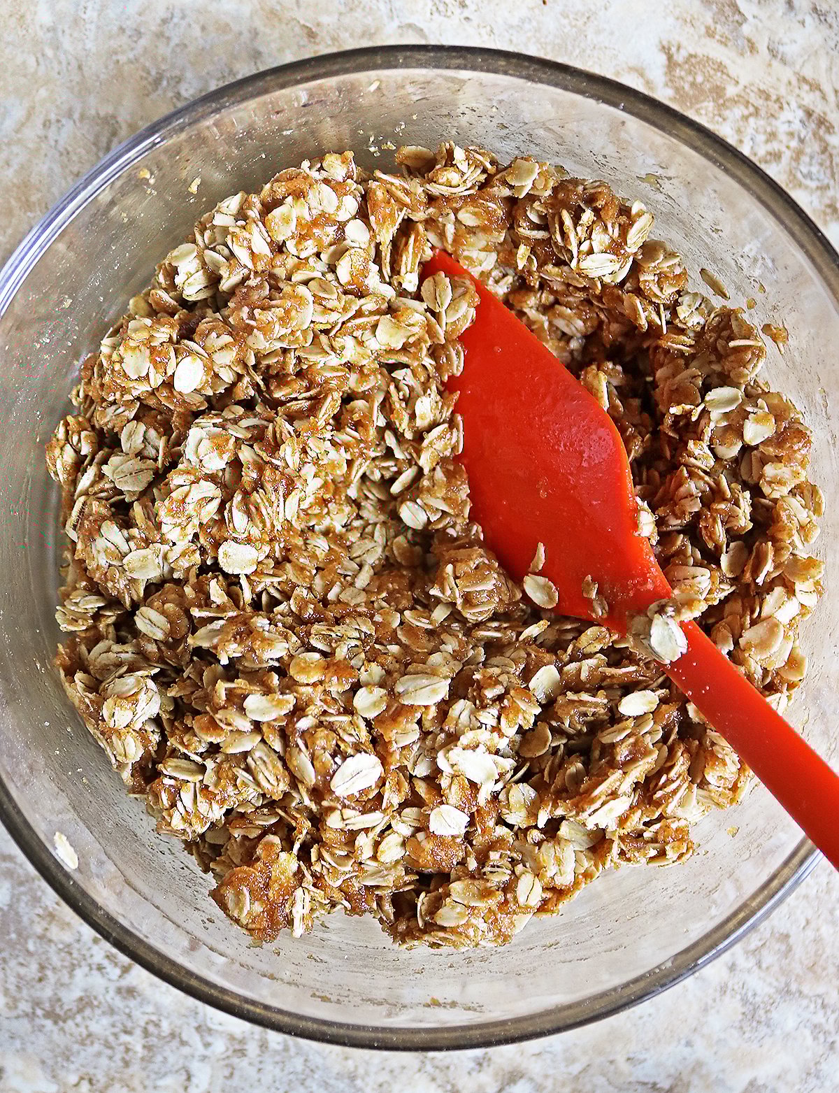 Mixing everything together to make granola-bar like granola