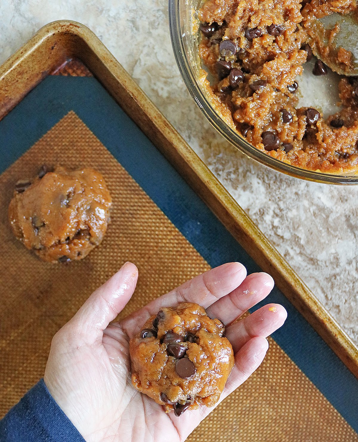 Shaping these easy PB Chocolate cookies