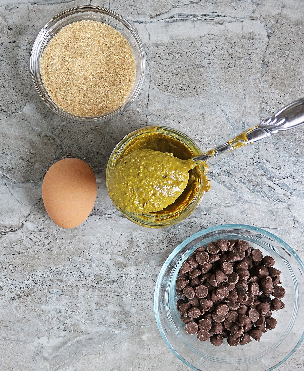 4 ingredients needed to make pistachio butter chocolate chip cookies