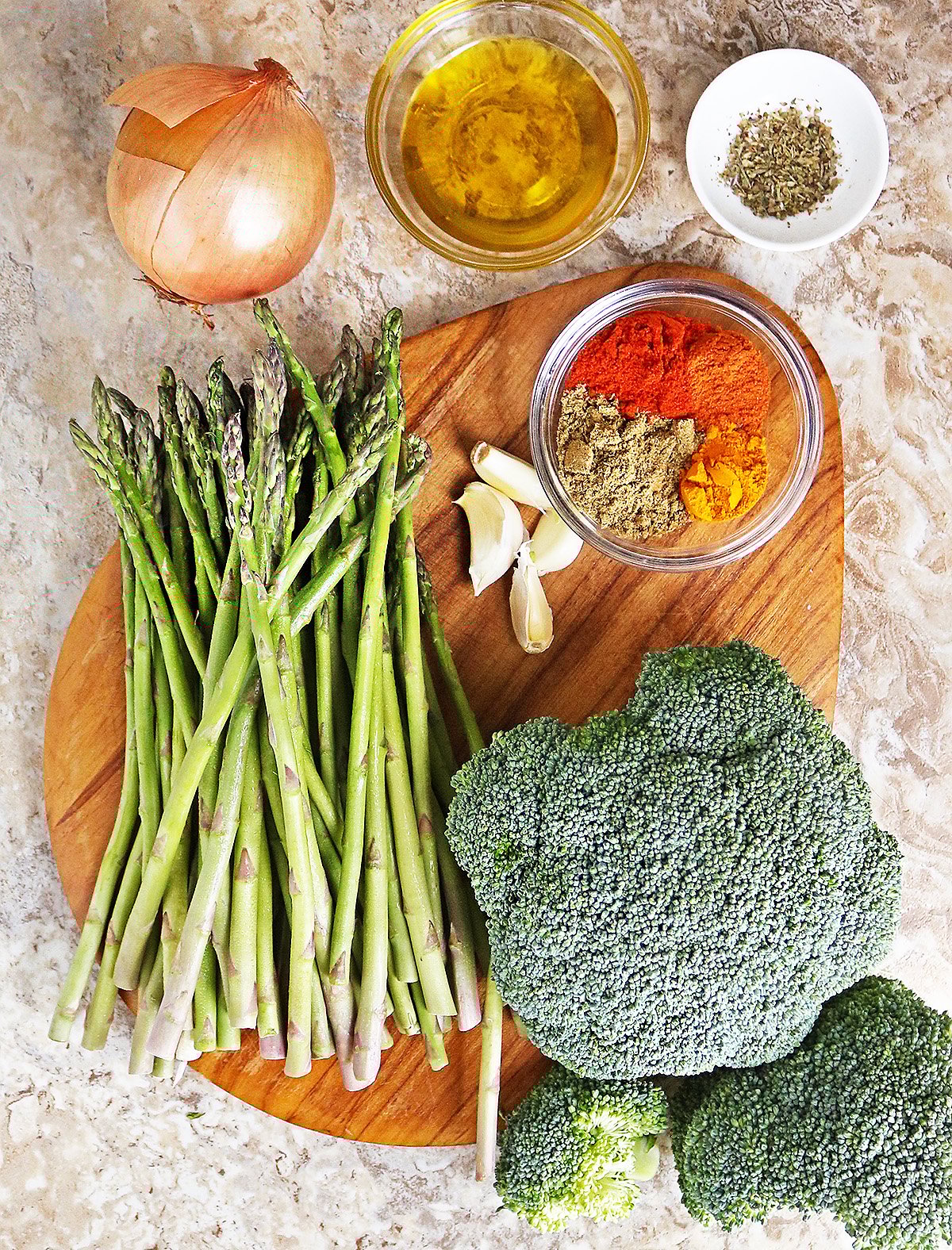 ingredients to make sauteed broccoli and asparagus.