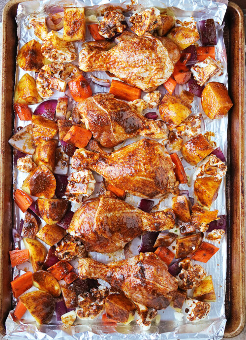 veggies and chicken brushed with delicious spice mix ready to bake