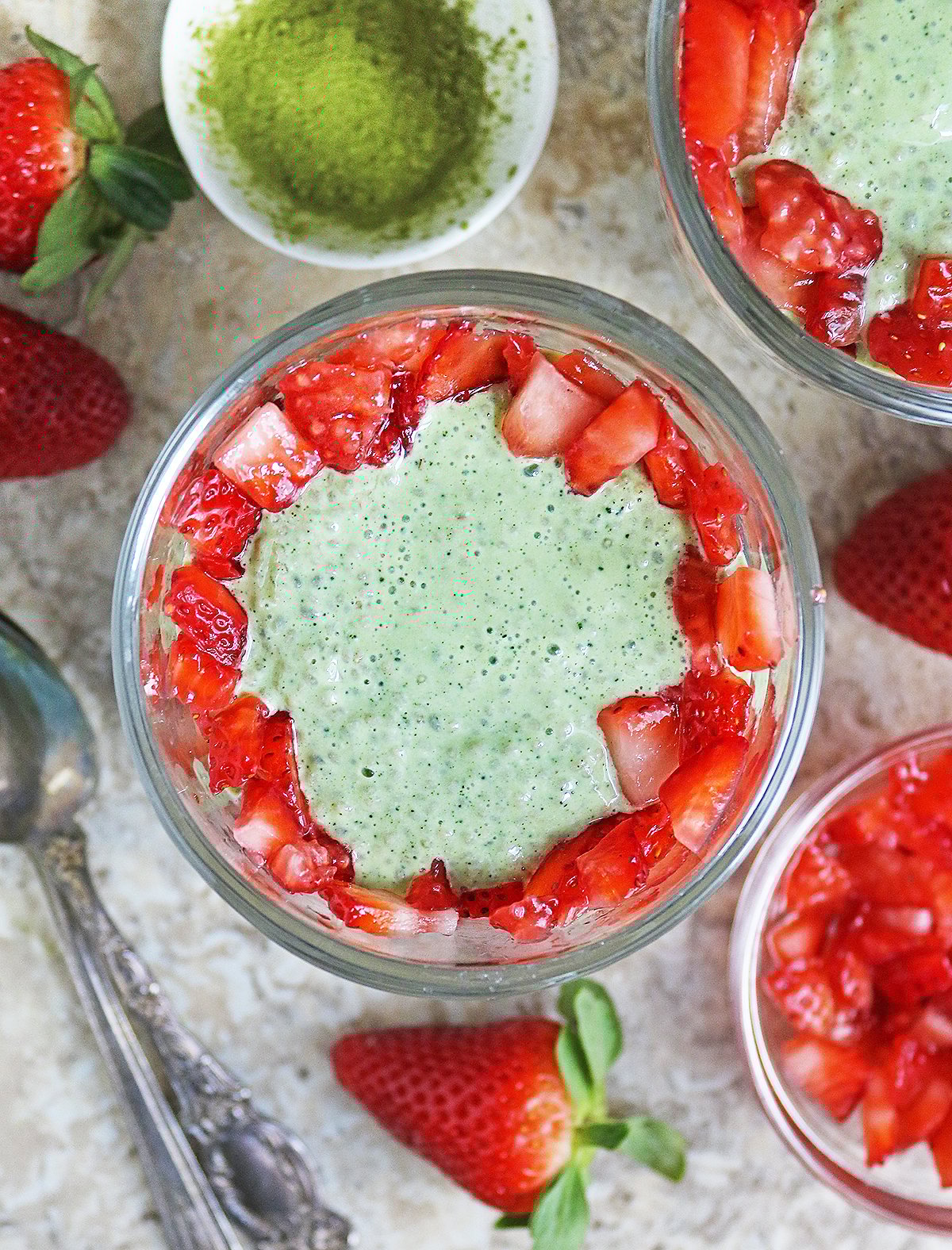 My favorite matcha chia pudding with yogurt and fresh strawberries.