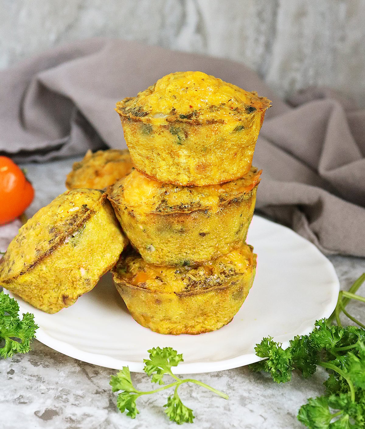 A stack of turmeric egg bites meal prepped for the week