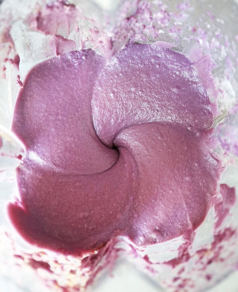 Blending the ingredients for the filling of this barney pie.