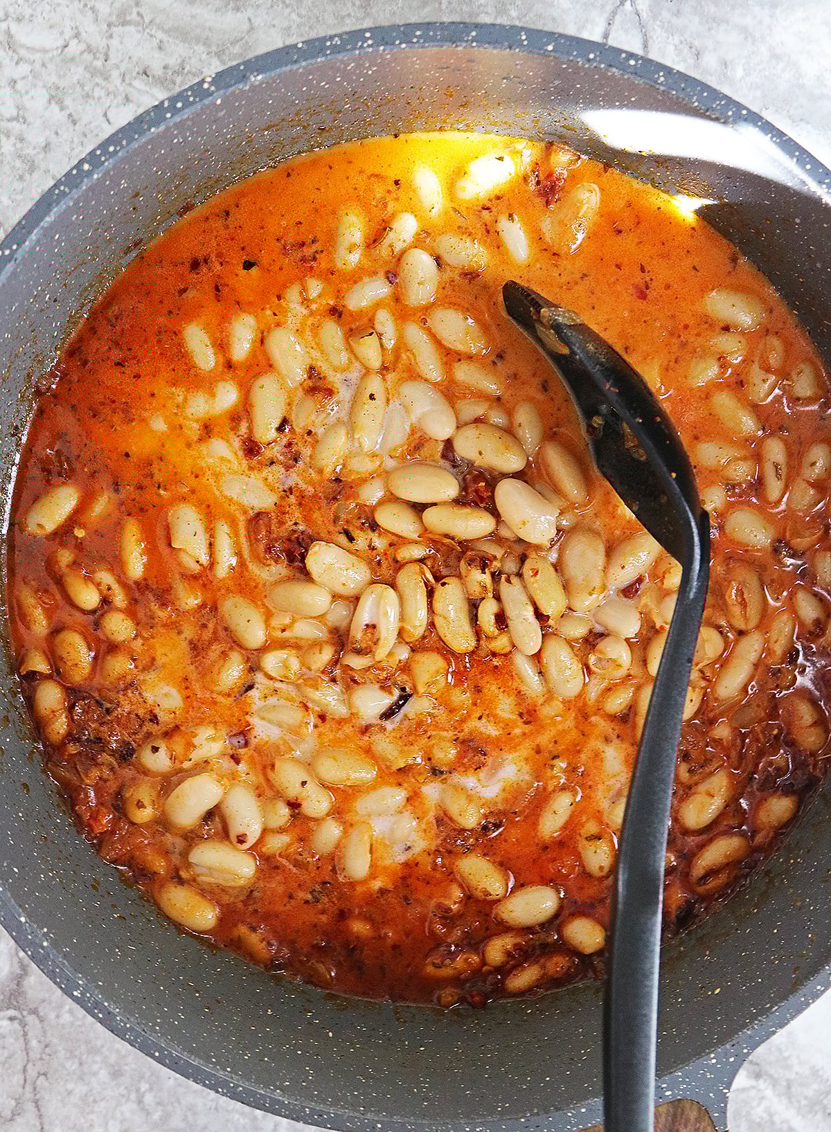 Making this easy White Bean Marry Me Skillet
