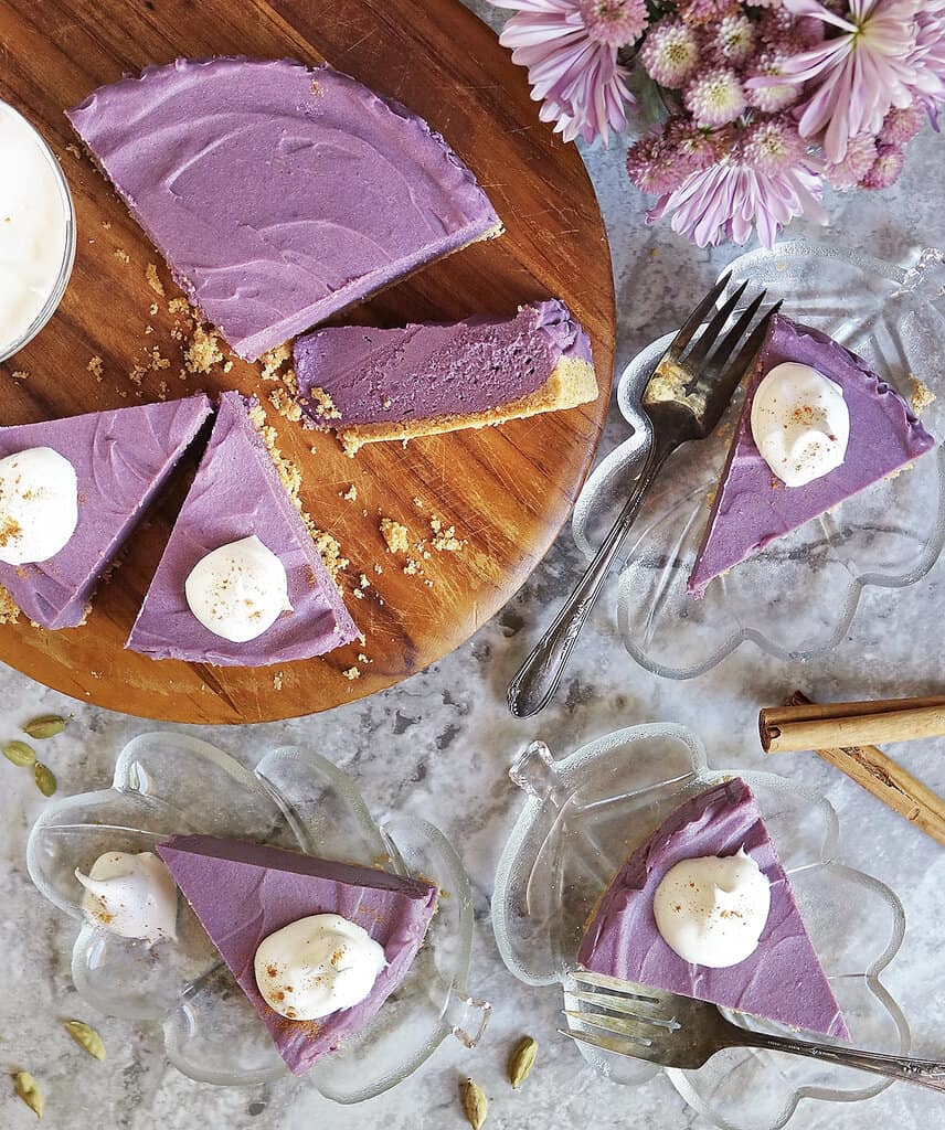 Overhead view of No-bake Sugar-free Purple Sweet Potato Pie AKA Barney Pie on serving plates, ready to be enjoyed.