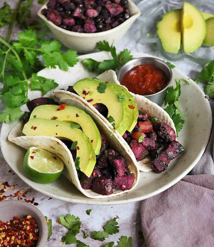 Delicious well spiced black bean and purple sweet potato tacos