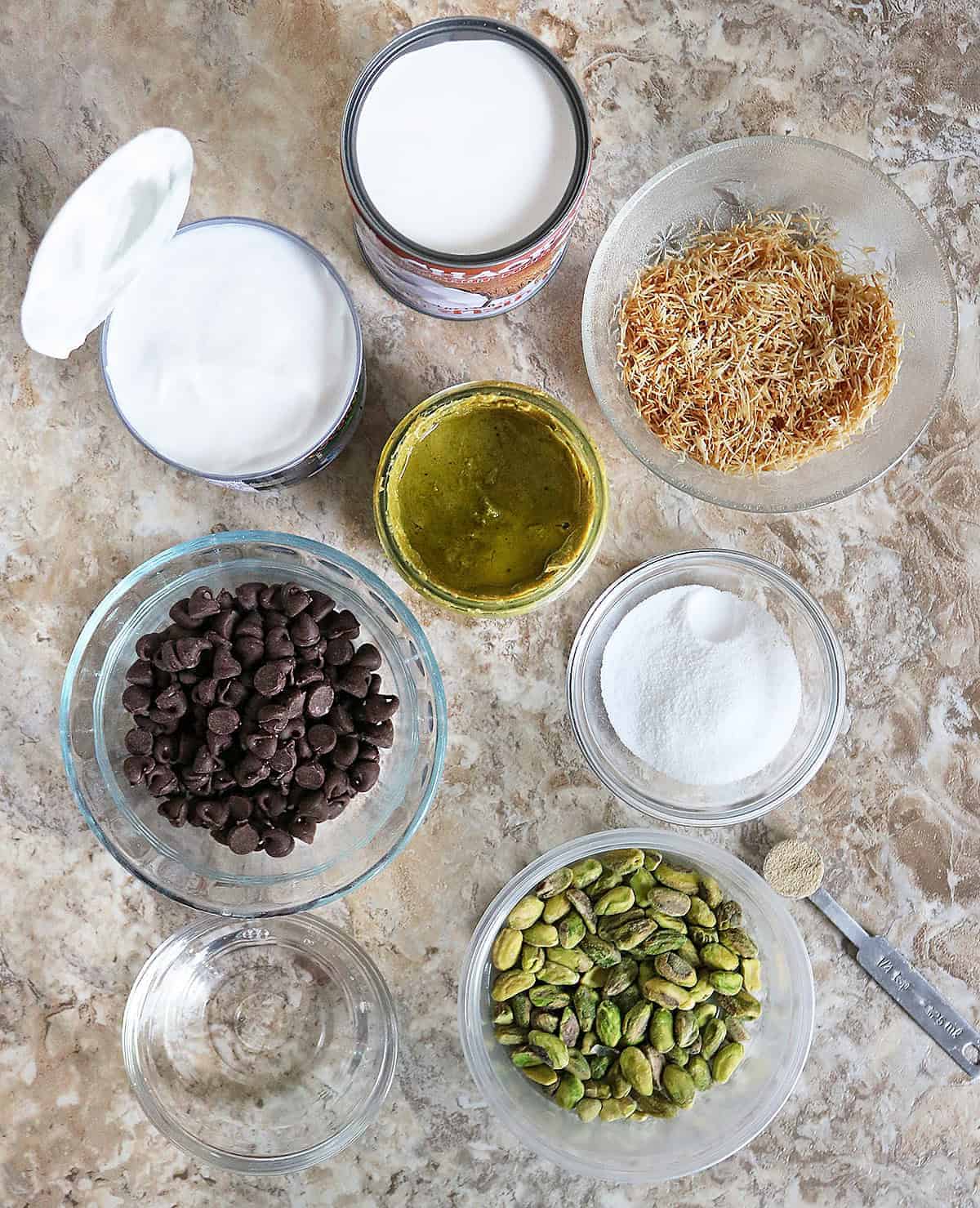 Ingredients to make all the layers of a Dubai Chocolate Cheesecake
