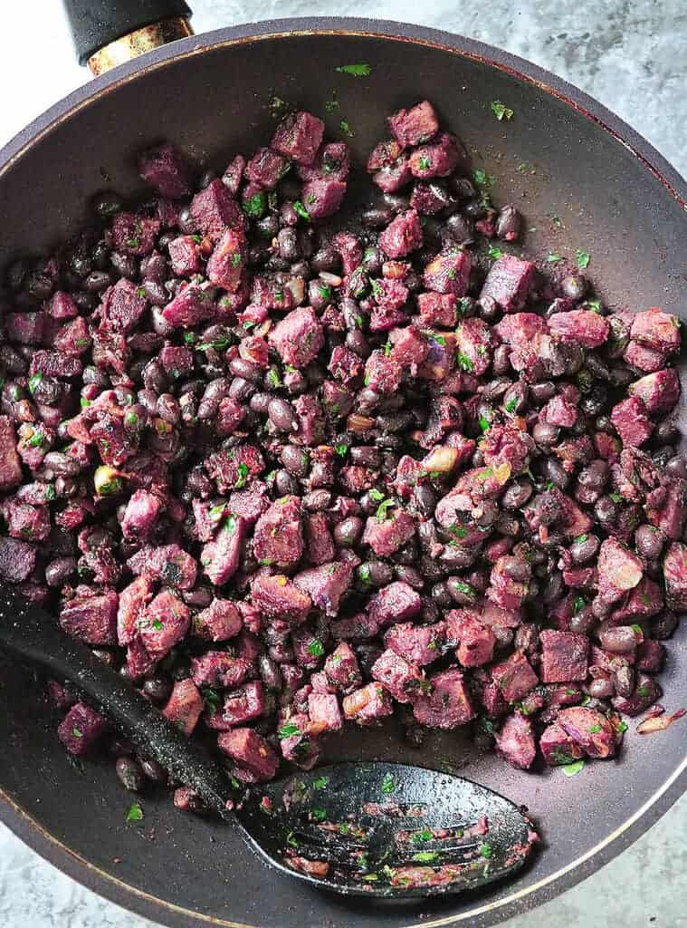 delicious spicy purple sweet potato and black bean skillet