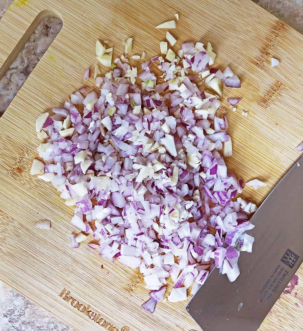 dice the onion and garlic fine