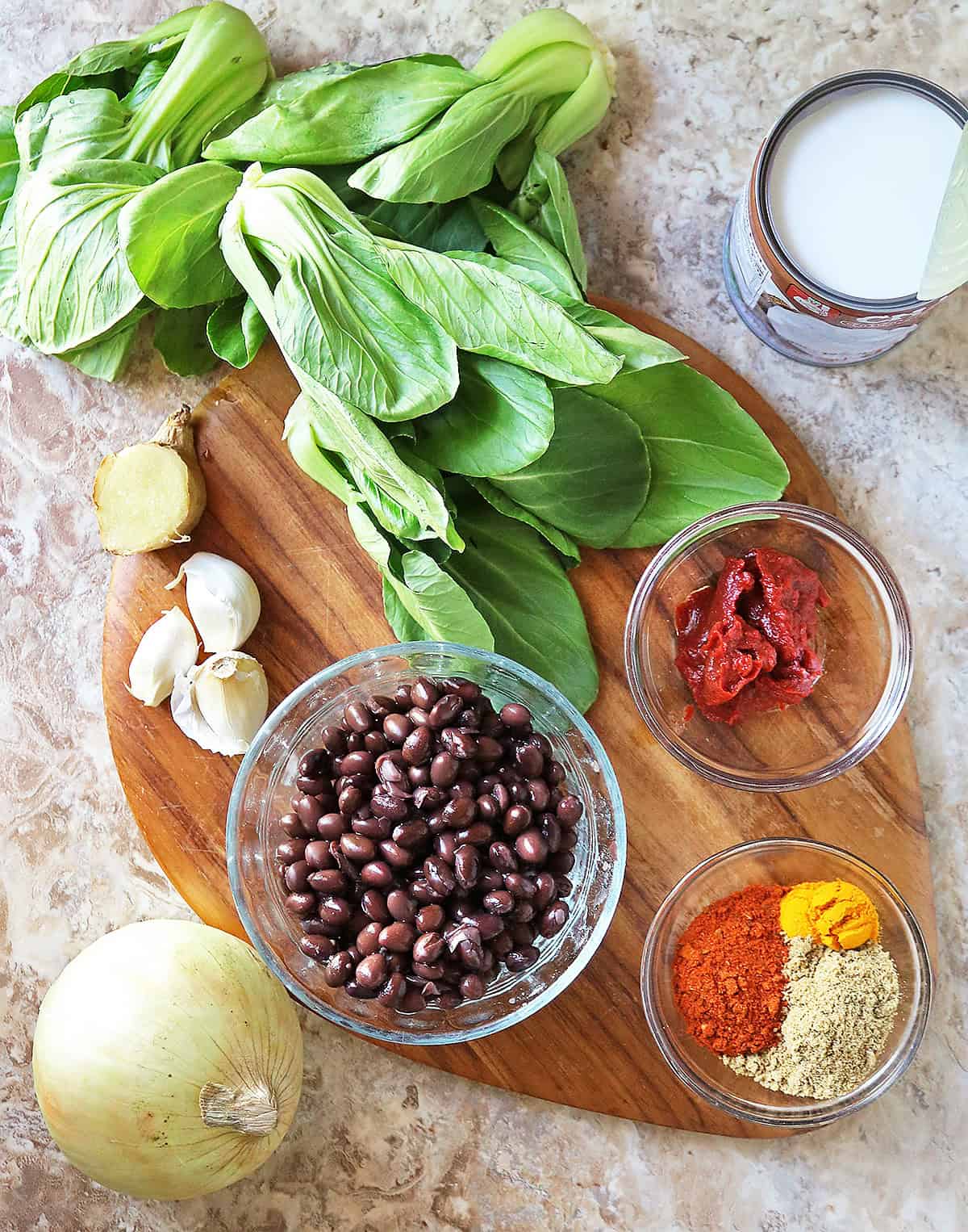 Ingredients to make a vegan bok choy and black bean curry