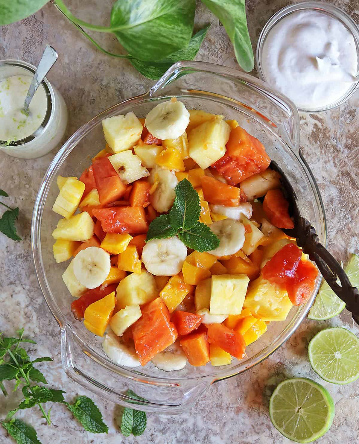 Sri Lankan fruit salad with mint coconut sauce and coconut whipped topping
