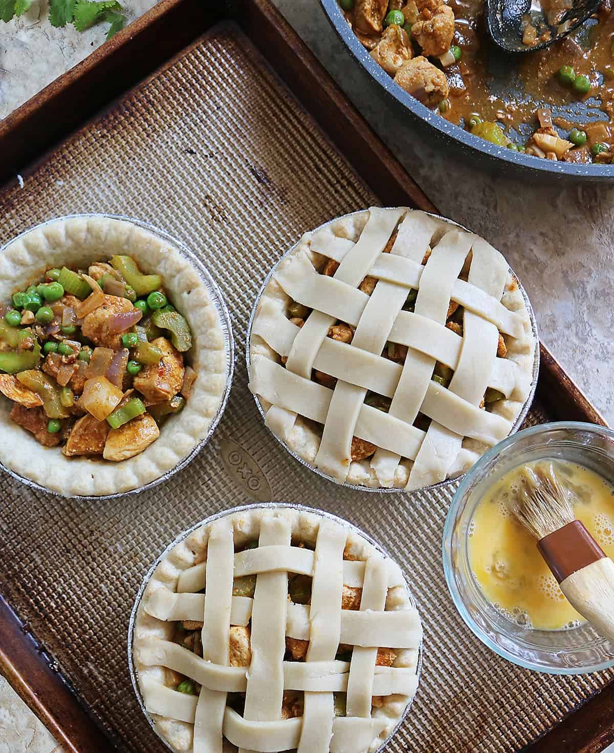 adding lattice to the top of chicken curry pot pies