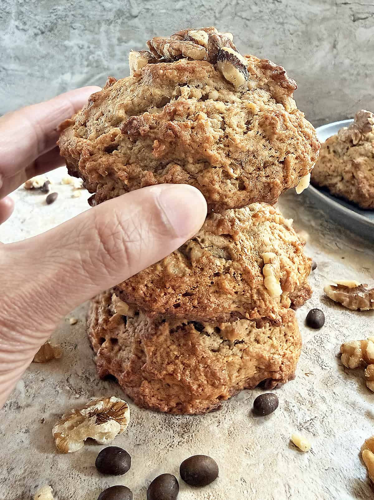 Stack of freshly baked coffee walnut muffin tops