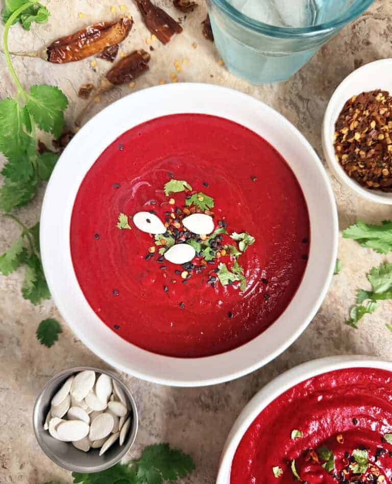 This roasted beetroot soup is creamy, vegan, and spiced with ginger, garlic, and smoked paprika. Blend, heat, and serve. Get the easy recipe now!