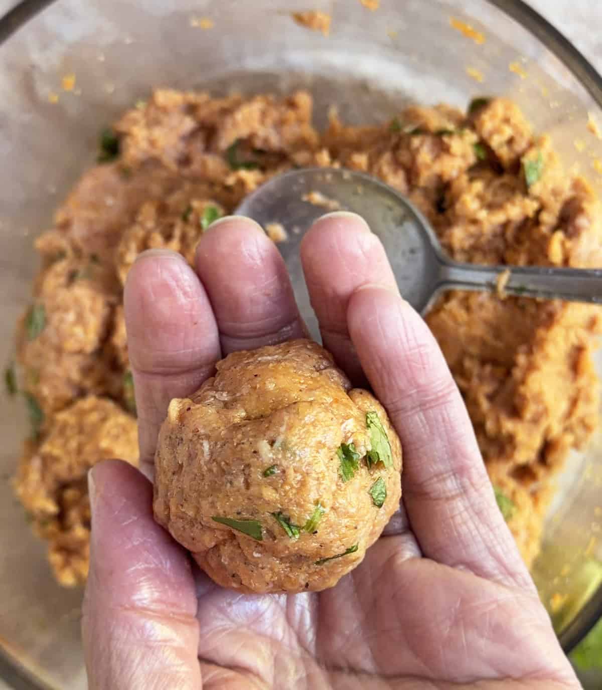 forming turkey meatballs with pumpkin
